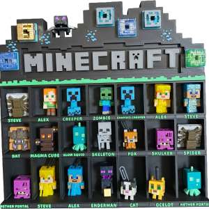 Czarna półka z wydruku 3D na figurki z gry Minecraft z wymiennymi napisami postaci i zielonymi detalami.